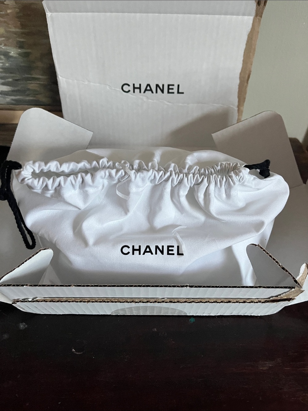 CHANEL White Drawstring Pouch with Black Logo